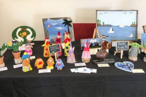 table with felt sculptures