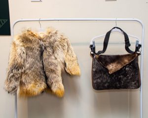 Animal fur pelt coat and utility bag