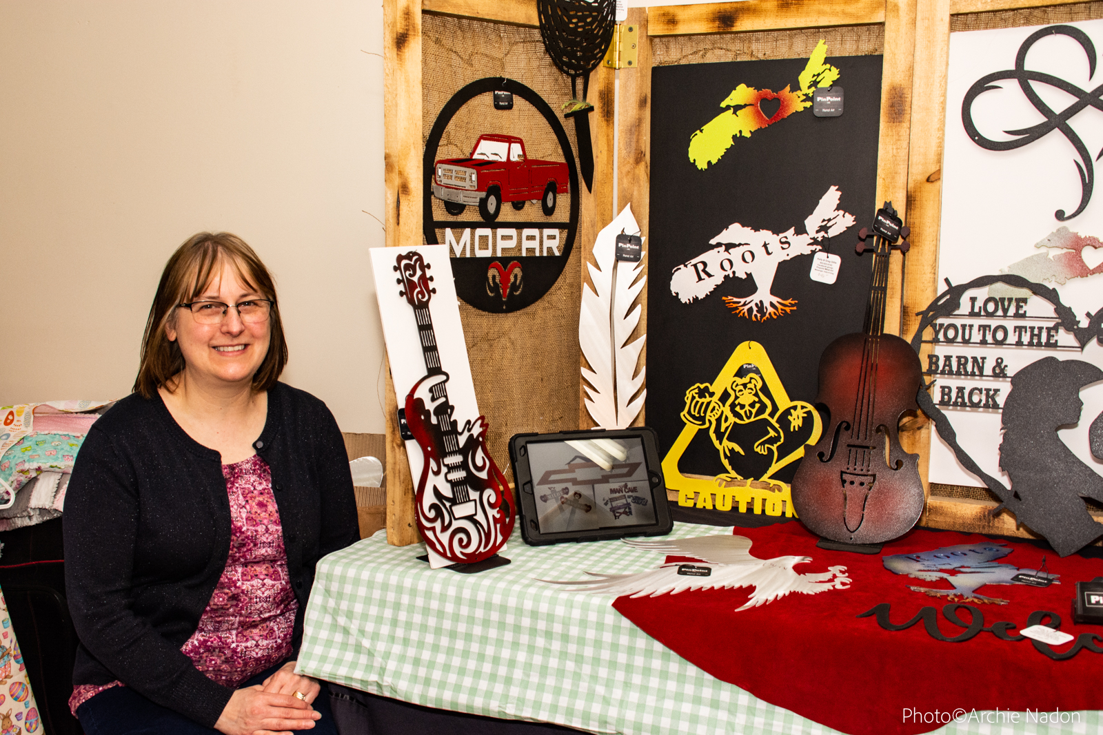 Kelly at a recent Saturday's Artisan Market selling their products.