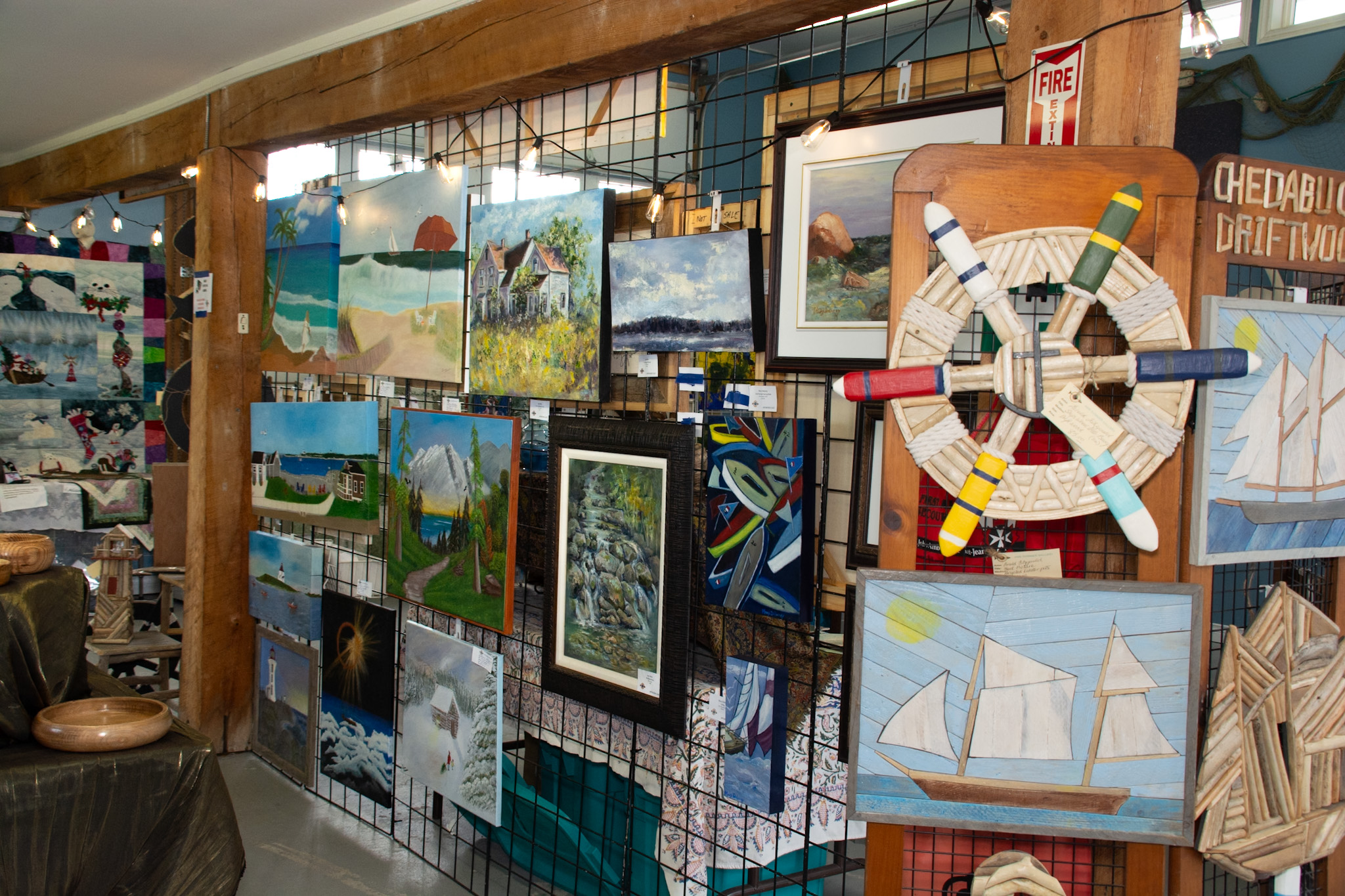 Artworks East's gallery in Guysborough is filled with art. After putting on the usual sales type events they were offered the building for the summers. The artists get together at the beginning of the season and pitch in to set everything up but then it's up to Suki Kamigawa to keep it updated and interesting.