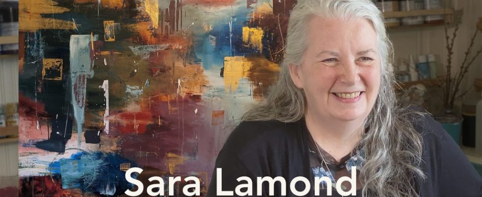 woman in front of painting