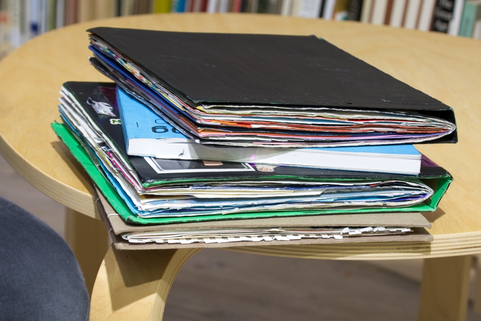 Although each book only has eight actual pages, by the time she's done layering sketches upon sketches, the books are pretty thick.