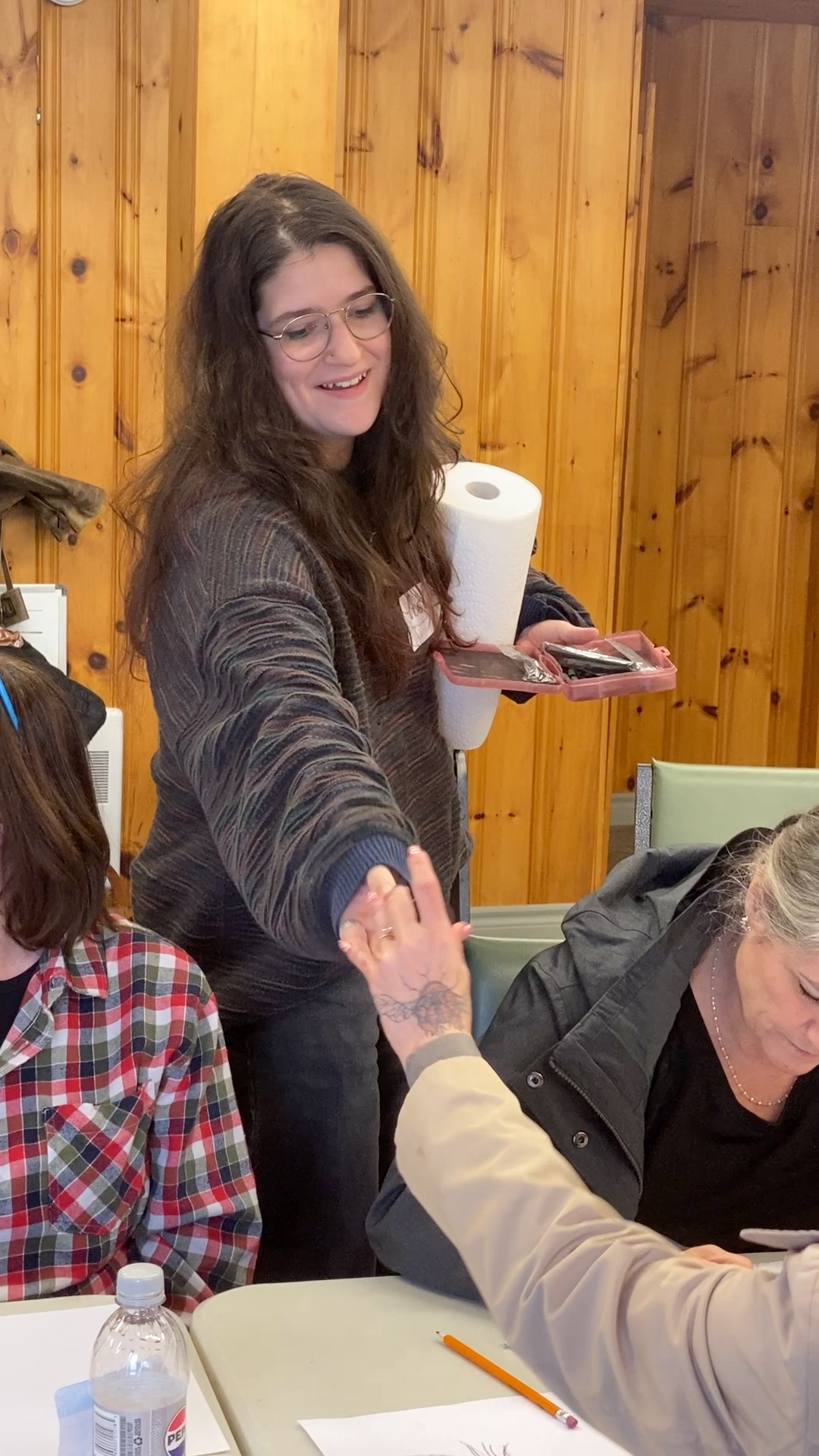 Part of her work at Cape Breton University Art Gallery has been accompanying her boss Greg Davies on his public outreach. Here she is at the same venue we met her originally, the Senior Centre in River Bourgeois.